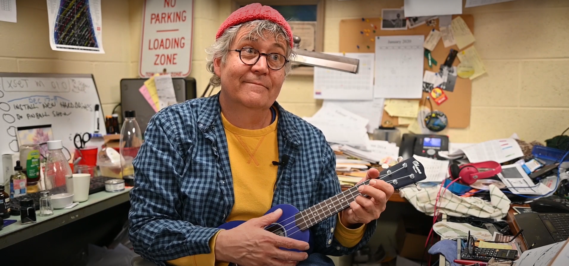 John French Playing the Ukulele. 